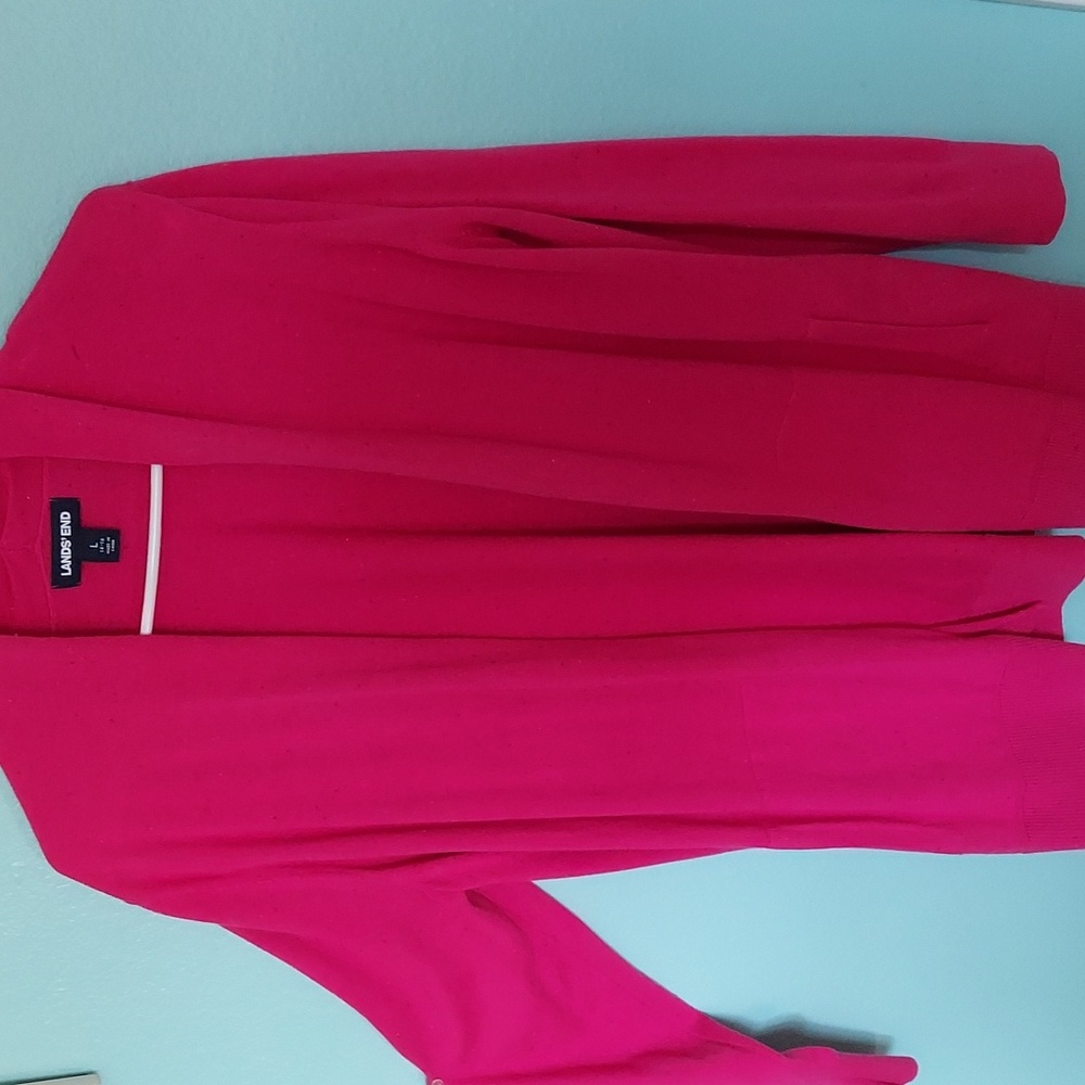 Cardigan with pockets. Very tiny specs of other colors.